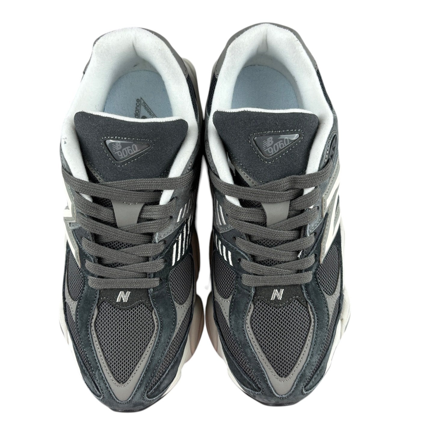Luxury Chef New Balance 9060 dark grey and white mesh and suede sneakers with laces.