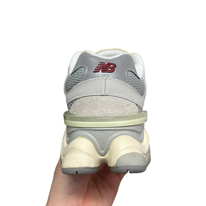 Luxury Chef New Balance 9060 grey and cream sneakers with mesh and suede details.