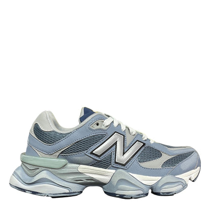 Luxury Chef New Balance 9060 sneakers in light blue and grey with white laces and silver N logo. Mesh and leather.