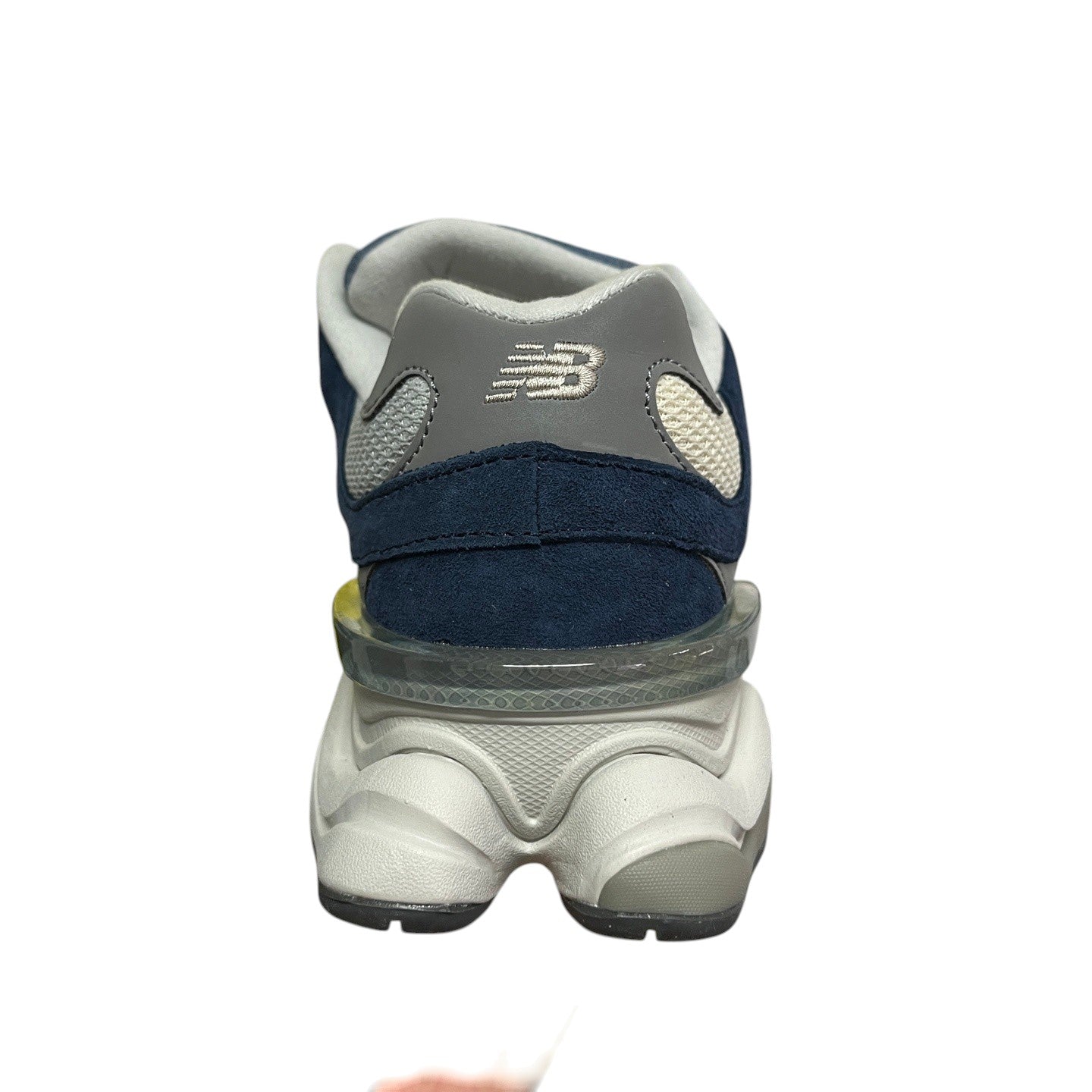 Luxury Chef New Balance 9060 navy blue suede and mesh sneakers with grey accents and a chunky white sole.