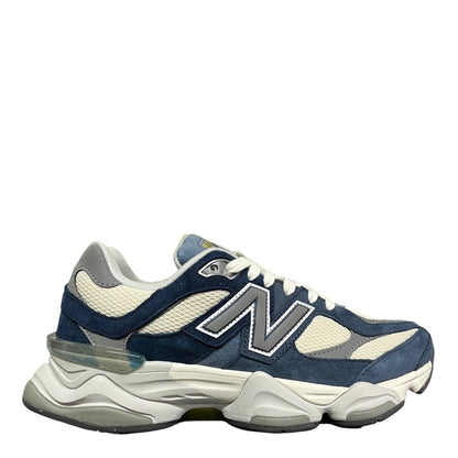 Luxury Chef New Balance 9060 sneakers in navy blue suede and cream mesh with grey accents and a chunky sole.