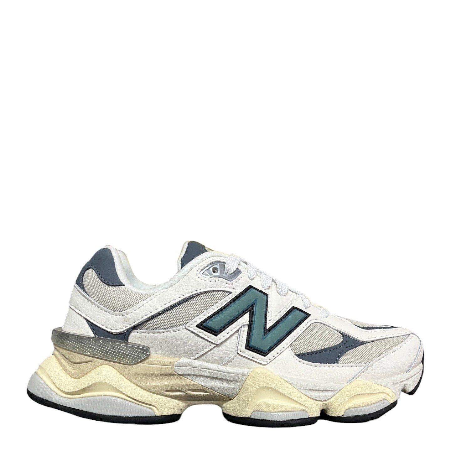 Luxury Chef New Balance 9060 sneakers in white, grey, and teal with a chunky sole and mesh panels.