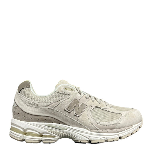 Luxury Chef NEW BALANCE 2002R beige suede and mesh sneakers with N logo and ENCAP sole.
