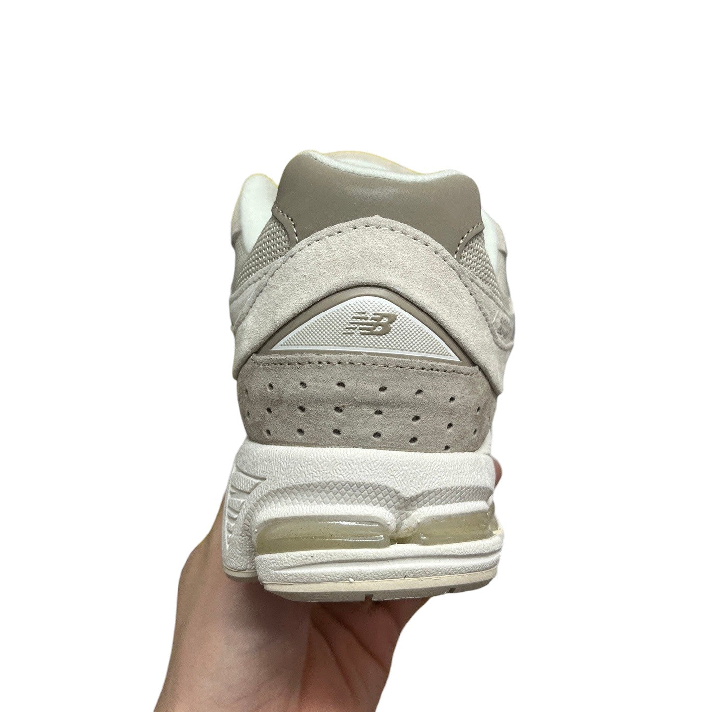 Luxury Chef NEW BALANCE 2002R beige suede and mesh sneakers with grey accents and N-ergy cushioning.