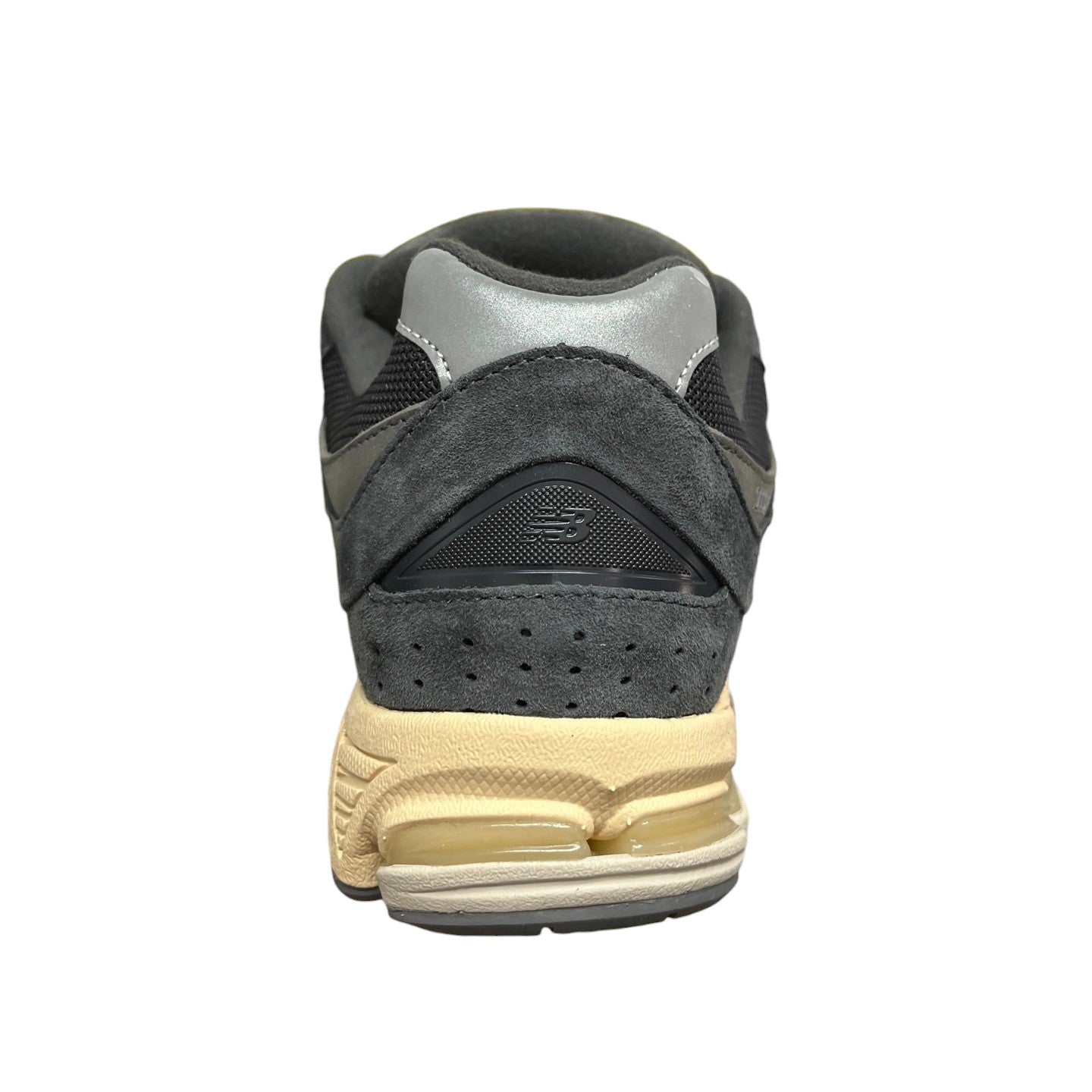 Luxury Chef New Balance 2002R dark grey suede and mesh sneakers with a cream sole.