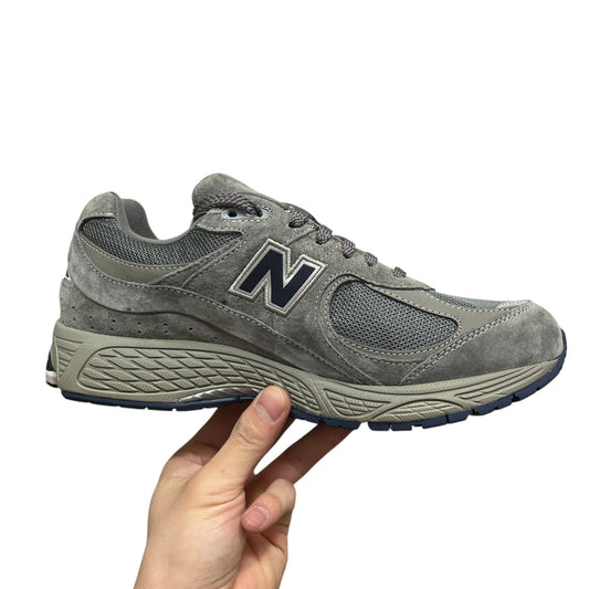 Luxury Chef New Balance 2002R grey suede and mesh sneakers with navy N logo.