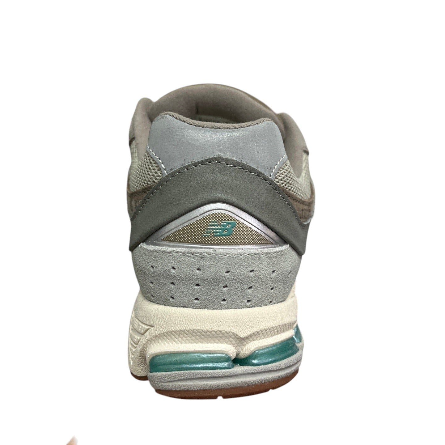 Luxury Chef NEW BALANCE 2002R grey suede and mesh sneakers with teal sole accents.