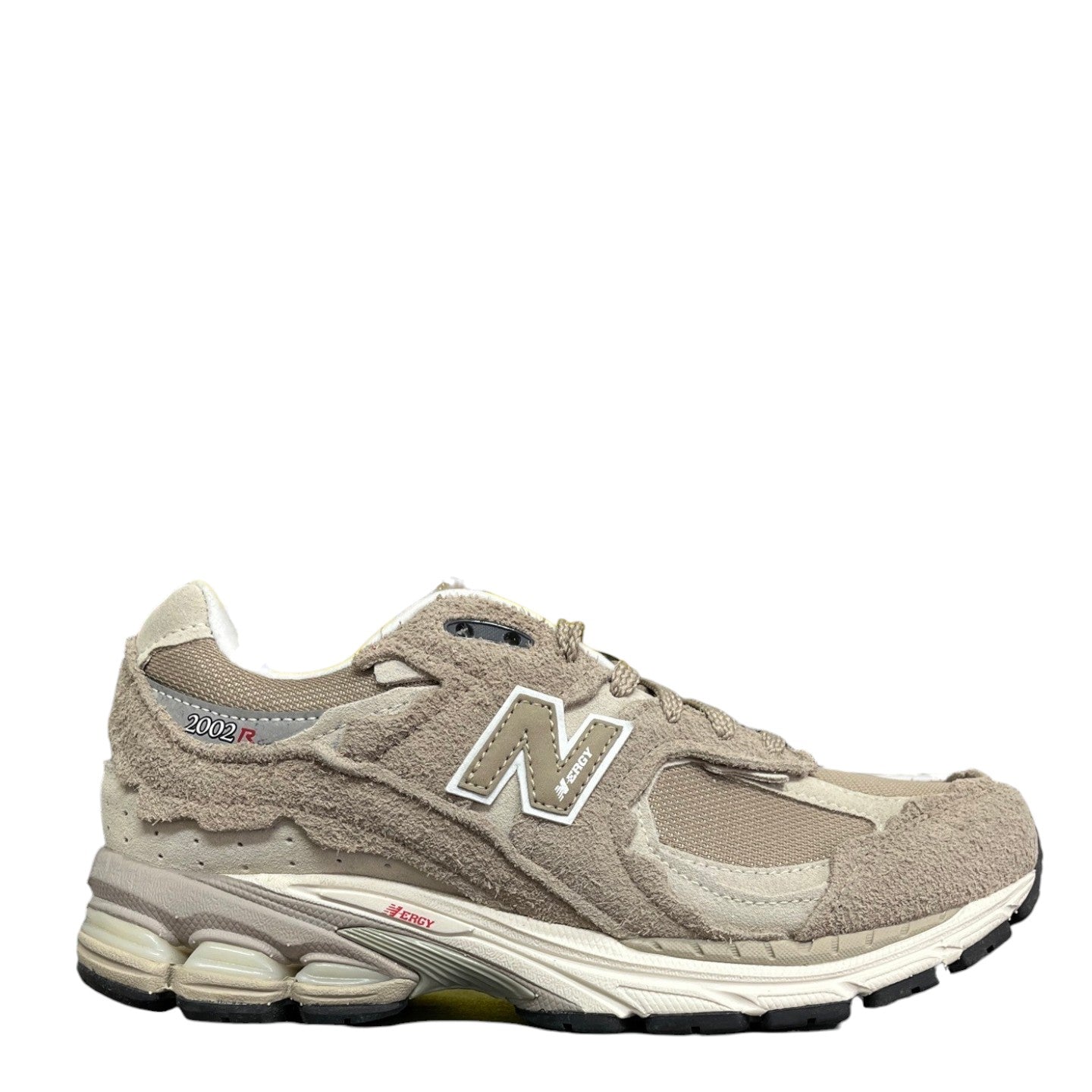 Luxury Chef New Balance 2002R taupe suede and mesh sneakers with cream accents and N logo.