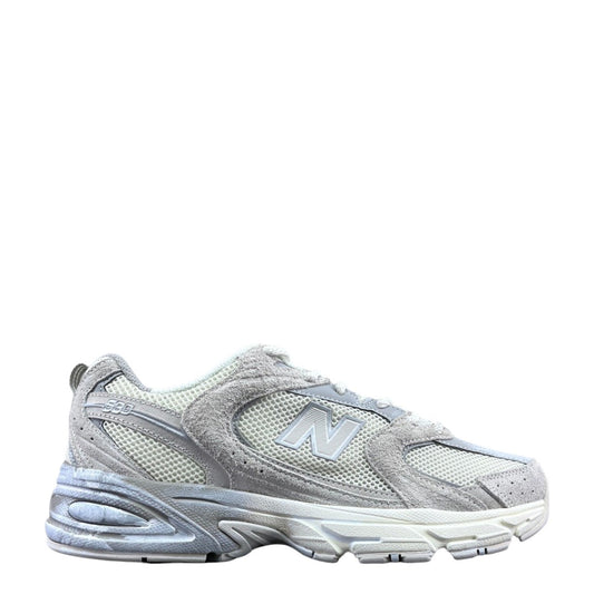 Luxury Chef New Balance 530 sneakers in light grey suede and white mesh with N logo.