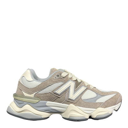 Luxury Chef New Balance 9060 beige and white suede and mesh sneakers with a chunky sole.