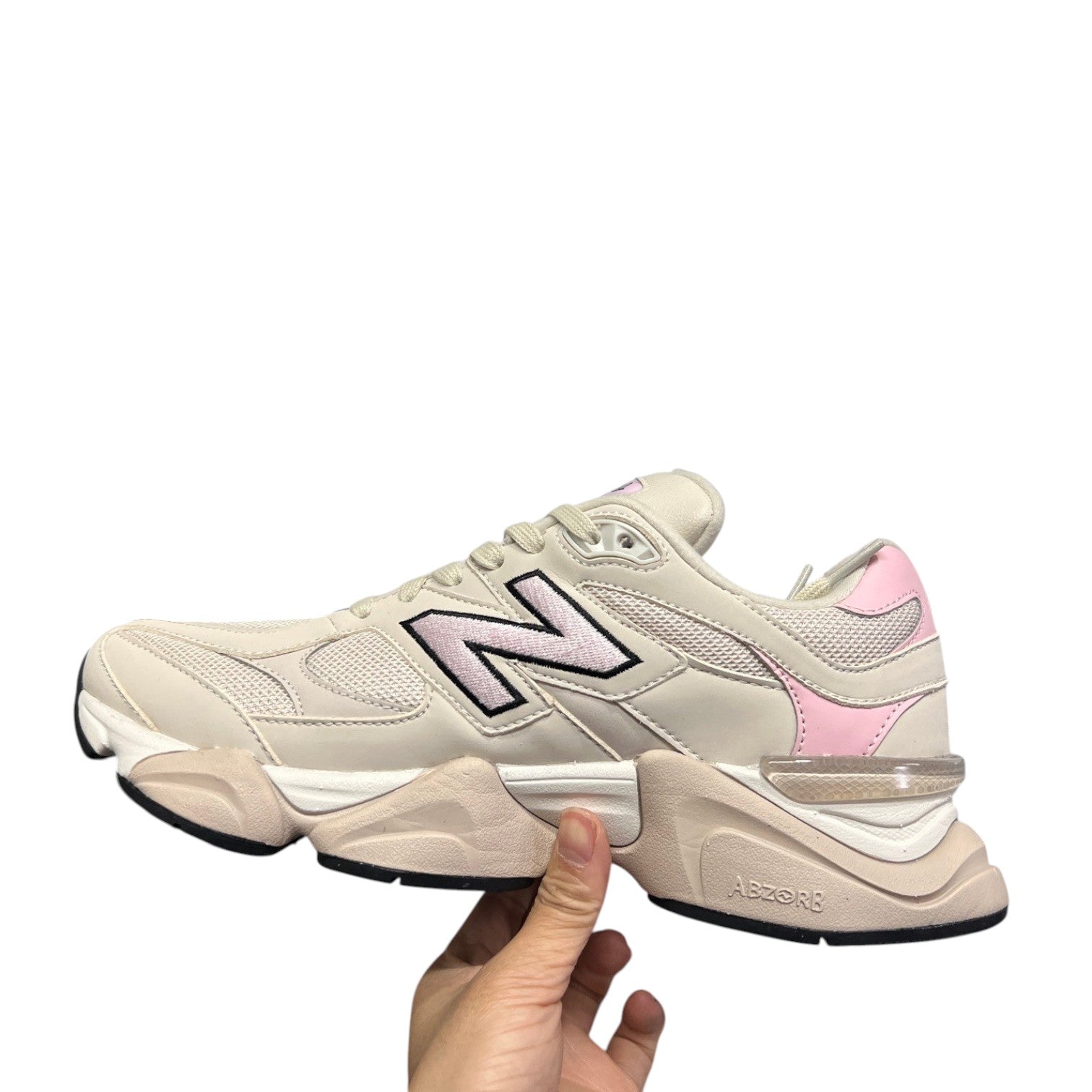 Luxury Chef New Balance 9060 sneakers in cream with light pink accents and a chunky sole.