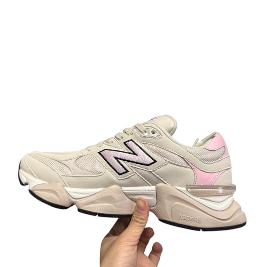 Luxury Chef New Balance 9060 sneakers in cream with light pink accents and a chunky sole.