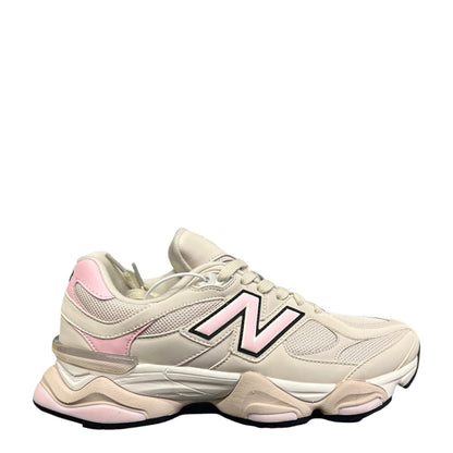Luxury Chef New Balance 9060 sneakers in cream with pink accents and a chunky sole.