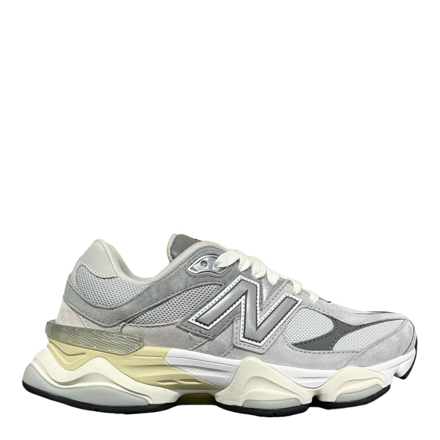 Luxury Chef New Balance 9060 grey suede and mesh lifestyle sneakers with a chunky sole.