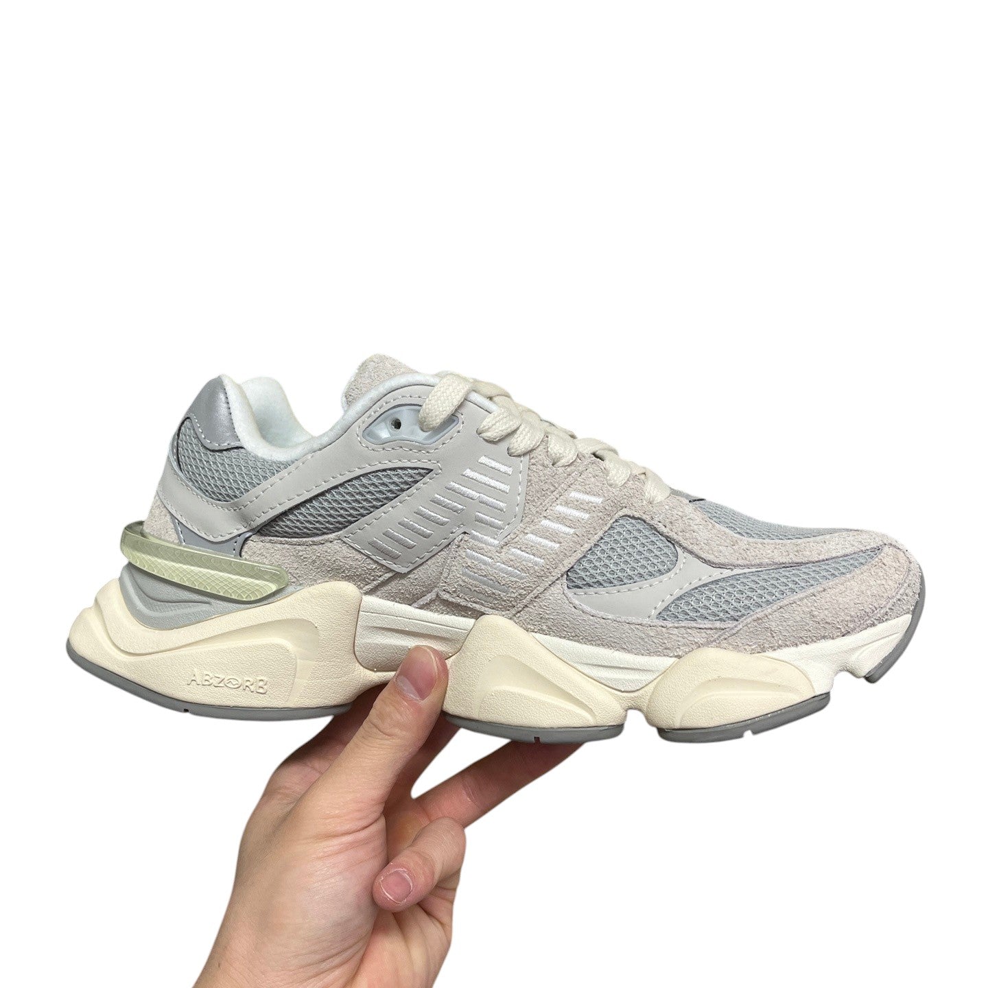 Luxury Chef NEW BALANCE 9060 light grey suede and mesh sneakers with cream sole and ABZORB cushioning.