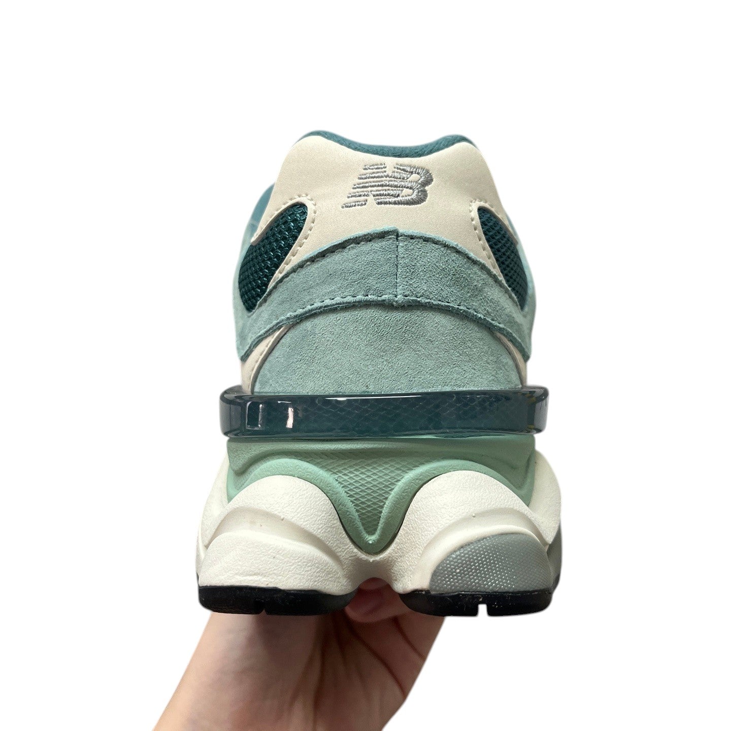 Luxury Chef New Balance 9060 sneakers in seafoam green and cream suede with mesh accents and a chunky sole.