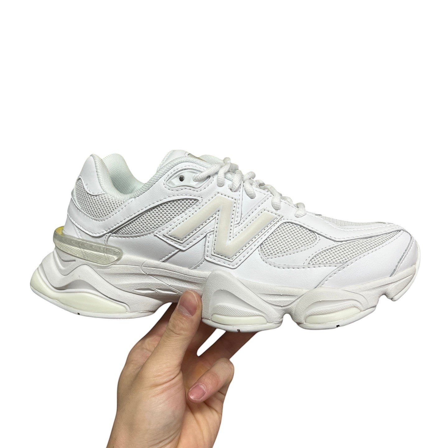 Luxury Chef New Balance 9060 white mesh and leather sneakers with chunky sole.