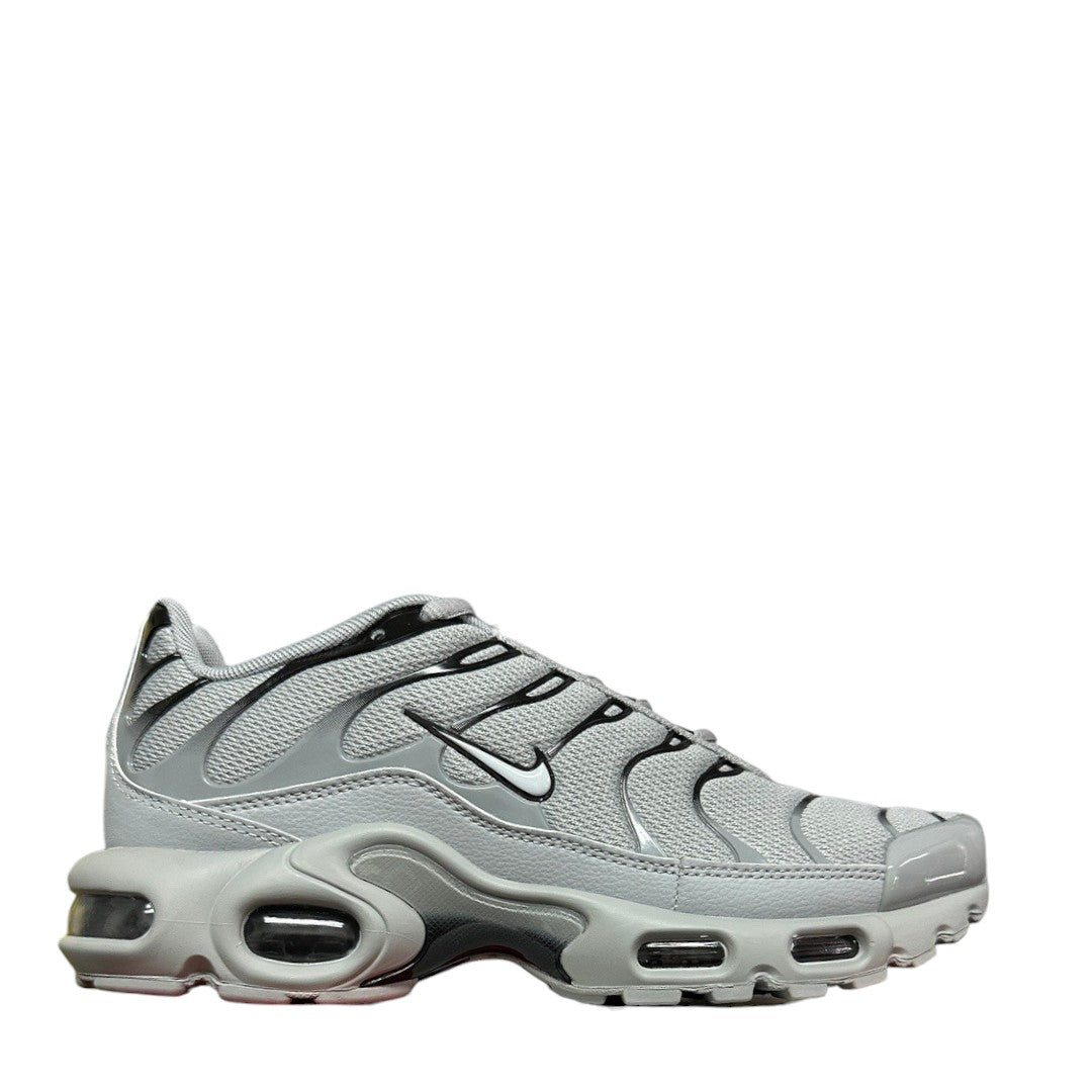 Luxury Chef Nike Air Max Plus sneakers in wolf grey, white, and black. Features mesh upper and signature cushioning.