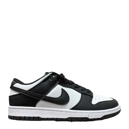 Luxury Chef Nike Dunk Low black and white leather sneakers with white sole and laces.