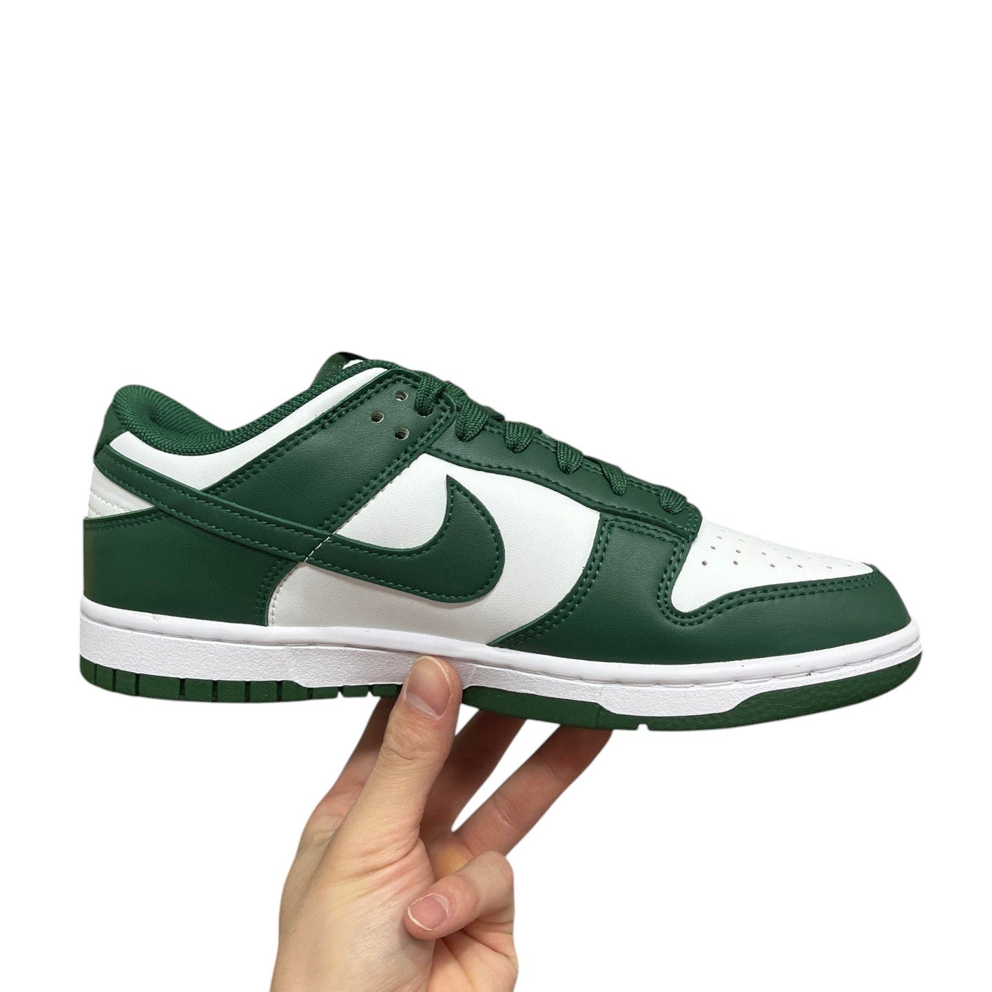 Luxury Chef Nike Dunk Low green and white leather sneakers with a classic low-top design and rubber sole.