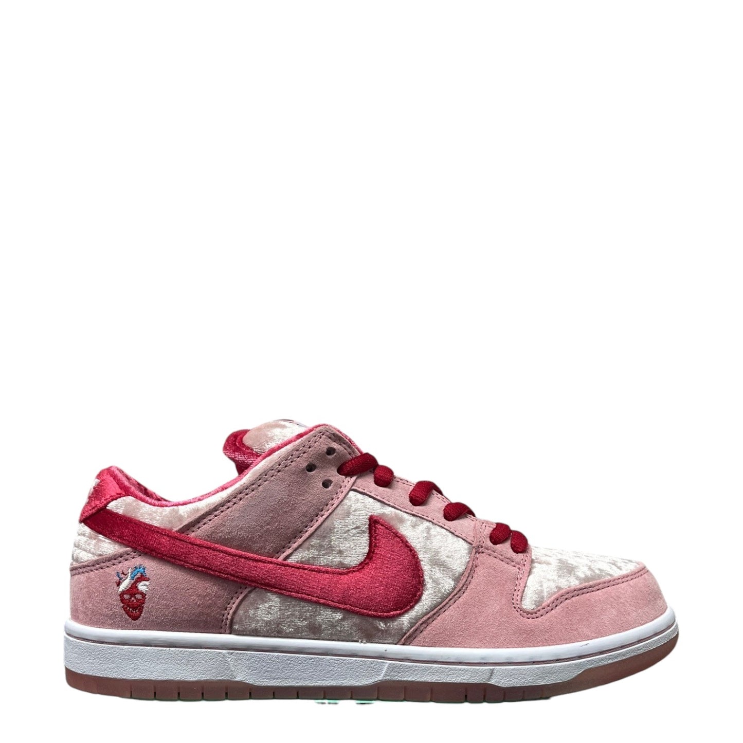 Luxury Chef Nike Dunk Low SB Strange Love sneakers in pink velvet with red accents and heart embroidery.