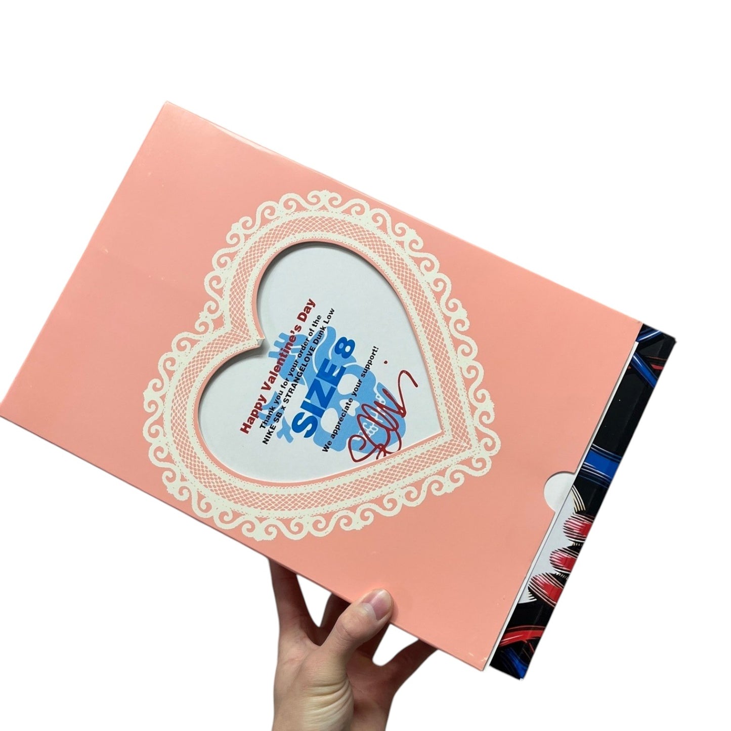 Luxury Chef pink heart-shaped box for Nike SB StrangeLove Dunk Low size 8 sneakers. Features Valentine's Day message.
