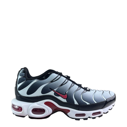 Luxury Chef Nike TN Air Max Plus sneakers in grey, black, white, and red. Features a gradient upper and visible air cushioning.