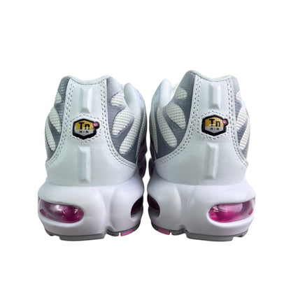 Luxury Chef Nike TN Air sneakers in white with grey accents and pink visible air cushioning. Features Tn Air branding.