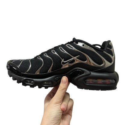 Luxury Chef Nike TN black mesh sneakers with silver accents and visible air cushioning.