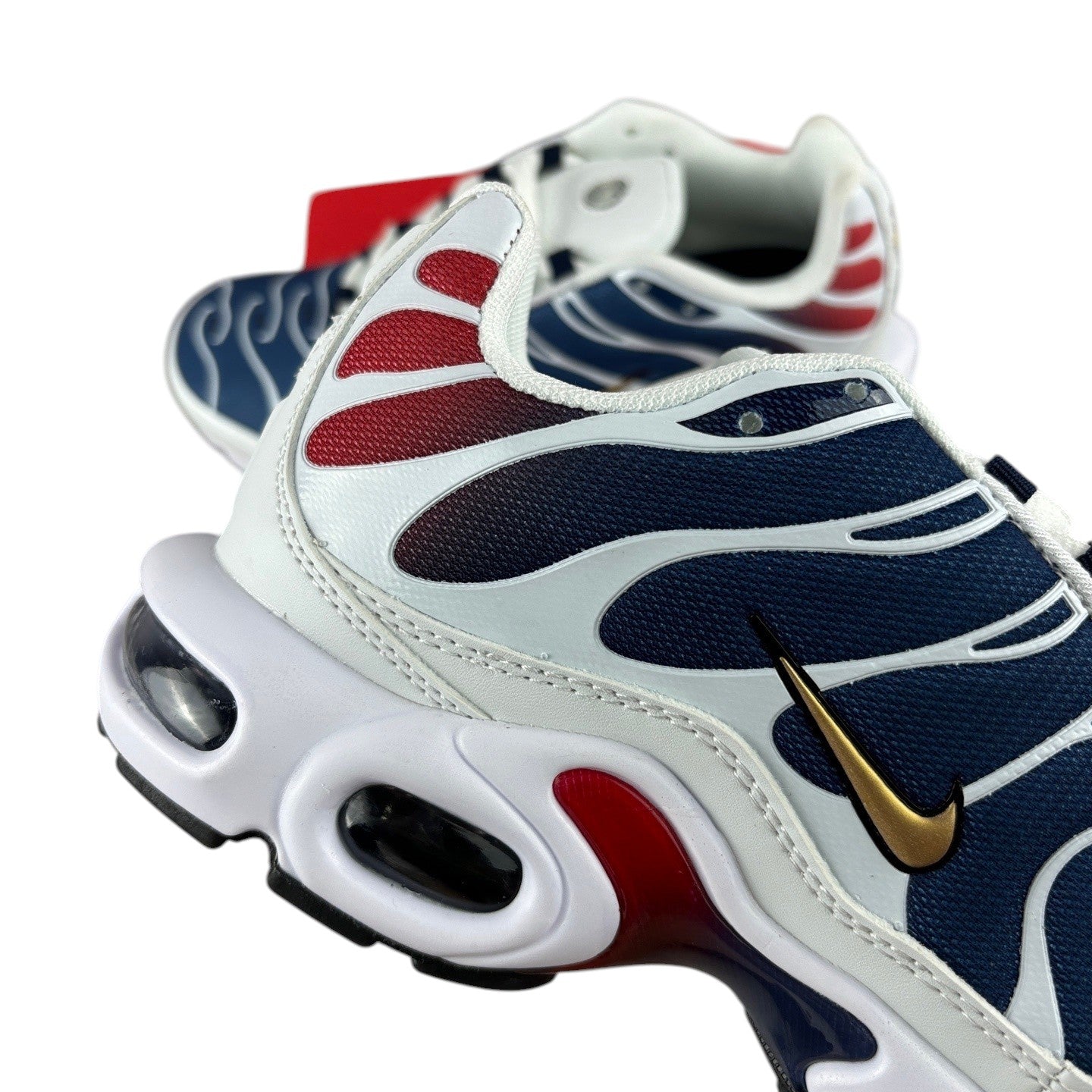 Luxury Chef Nike TN sneakers with white, navy, and red accents. Features a gold Nike swoosh.