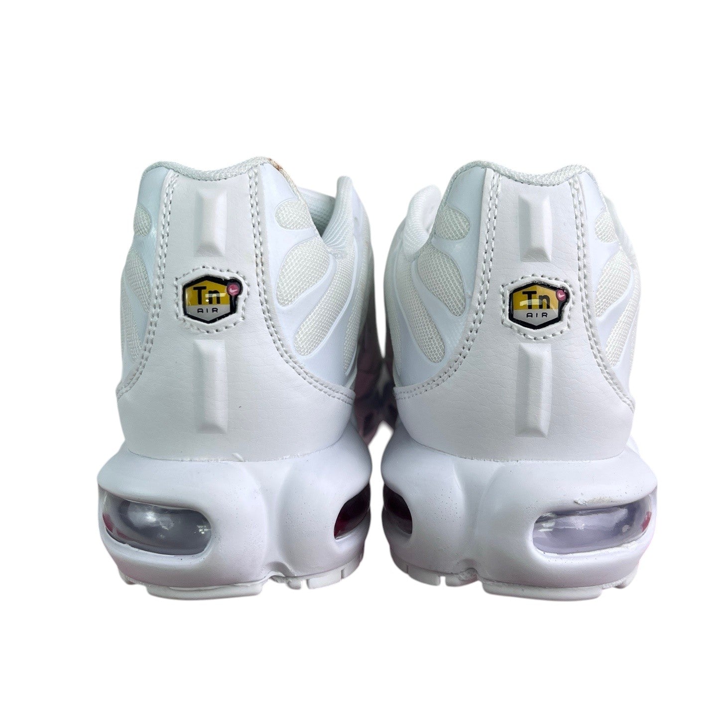 Luxury Chef Nike TN white leather and mesh sneakers with visible air cushioning and Tn Air branding.
