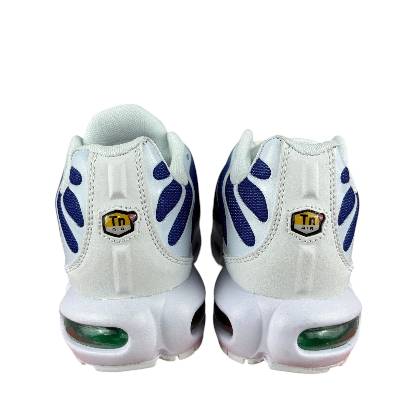 Luxury Chef Nike TN sneakers in white with blue accents and visible green air cushioning. Features Tn Air branding.