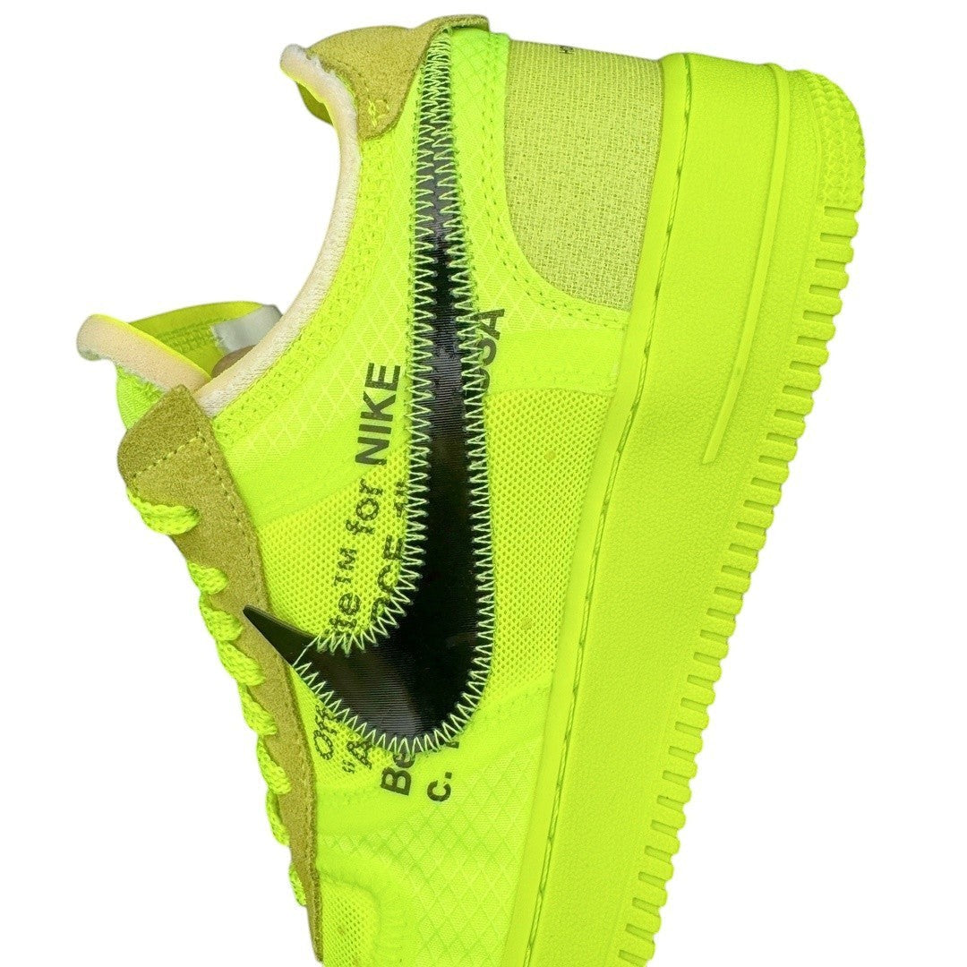 Luxury Chef Off-White Air Force 1 sneakers in neon yellow with black Nike swoosh and zip-tie detail.