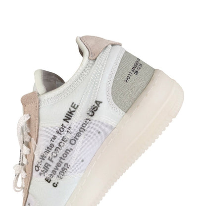 Luxury Chef Off-White x Nike Air Force 1 sneakers in white mesh and suede with text details.
