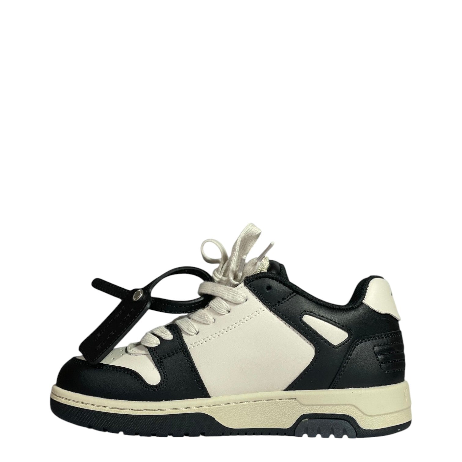Luxury Chef Off-White Out of Office sneakers in black and white leather with a cream sole and black tag.