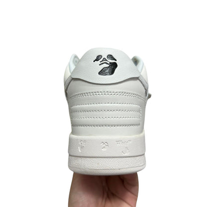 Luxury Chef Off-White Out of Office white leather sneakers with black logo detail on heel and embossed branding on sole.