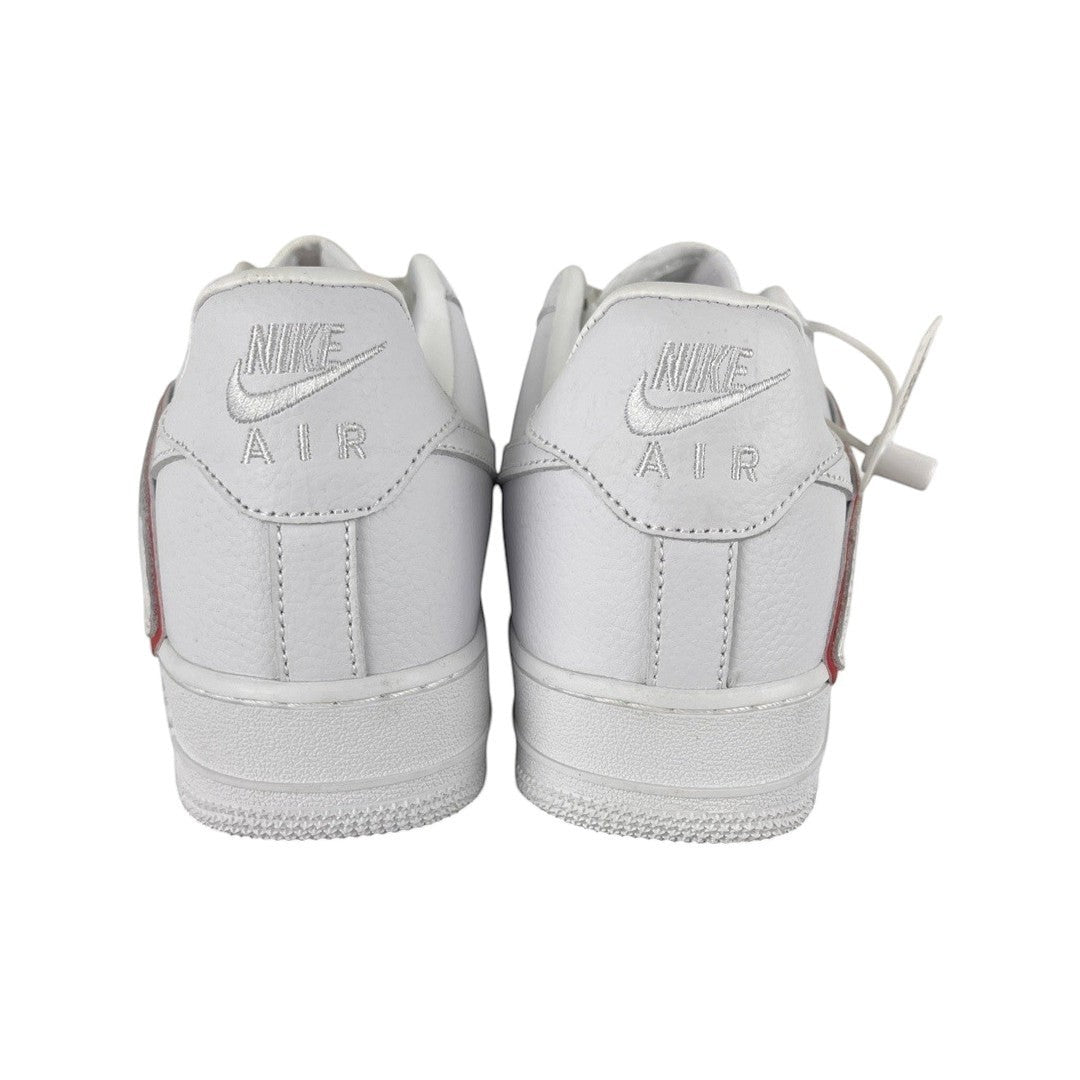 Luxury Chef white leather Nike Air Force 1 CPFM sneakers with red accents on the heel tab.