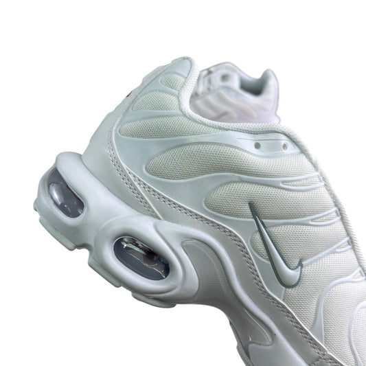 Luxury Chef white Nike TN sneakers with mesh upper and visible air cushioning in the sole.
