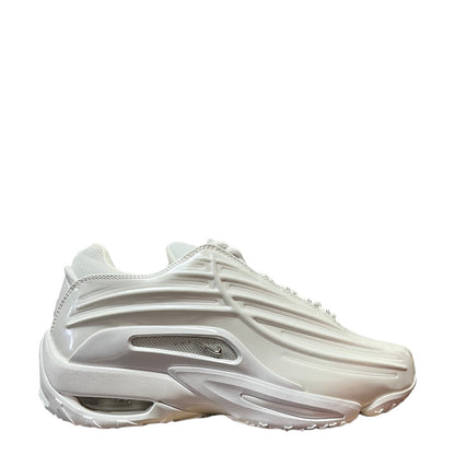 Luxury Chef NOCTA HOT STEP II white sneakers with chrome accents and visible air cushioning.