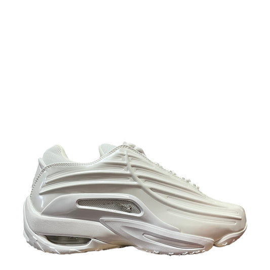 Luxury Chef NOCTA HOT STEP II white sneakers with chrome accents and visible air cushioning.